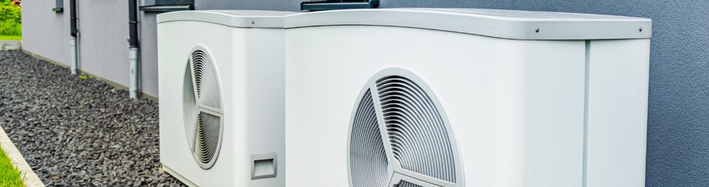 Photo of two heat pumps in a residential application.
