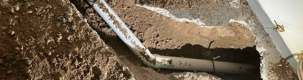 An aerial view of a damaged sewer line.